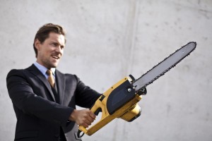 Kozzi-angry_businessman_wielding_a_chainsaw-3485x2323